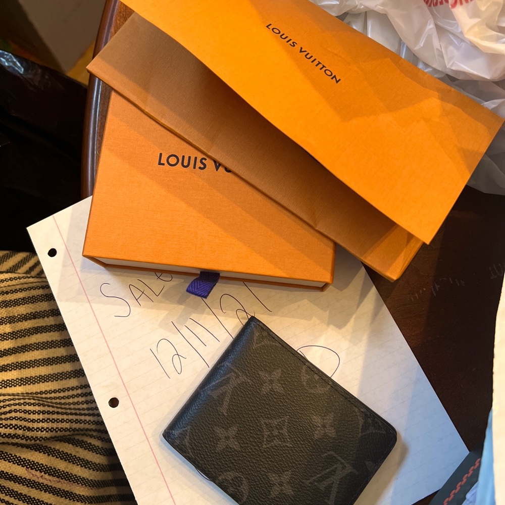 Brand new LV (can easily be unisex) monogram slender eclipse wallet.